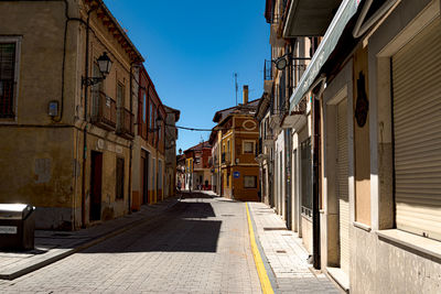 Narrow alley along buildings