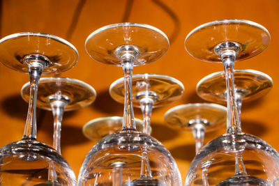 Close-up of wineglasses on table in bar