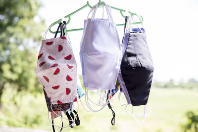 Close-up of clothes hanging on clothesline