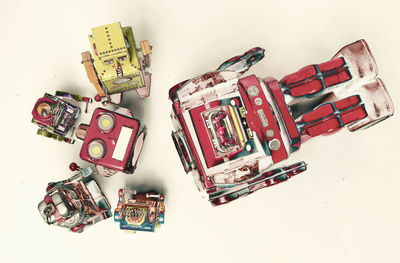 High angle view of toys on table against white background