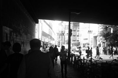 People walking on street in city