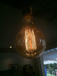 Low angle view of illuminated light bulb