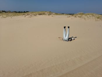 Sand in desert against sky