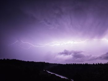 Scenic view of lightning in sky at night