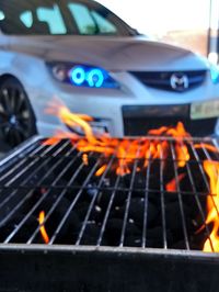 Close-up of fire on barbecue grill