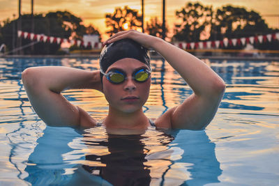 Portrait of woman swimming in pool