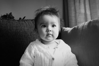 Portrait of cute baby at home