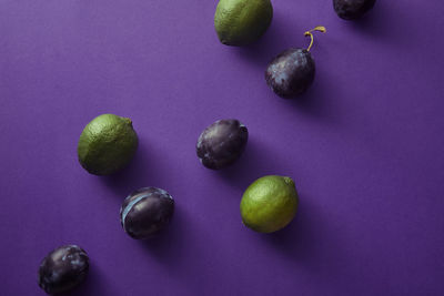 Directly above shot of fruits against blue background