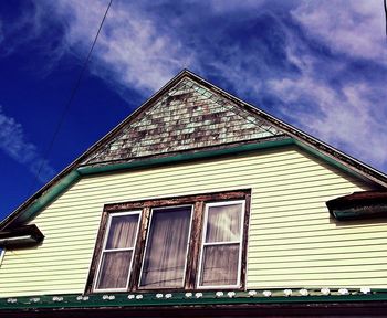 Low angle view of built structure against blue sky