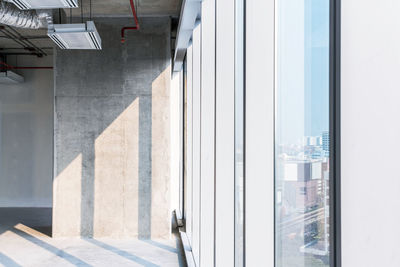 Reflection of building on glass window