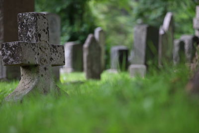 Stone cross in cemetery