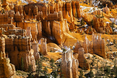 Close up telephoto zoom photo of bryce canyon national park hoodoos lit by sun