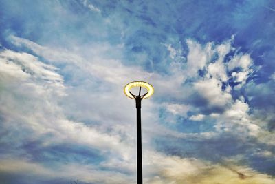 Low angle view of street light against sky