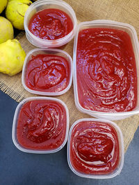 High angle view of red fruits in bowl