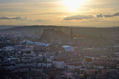 High angle view of townscape against sky at sunset