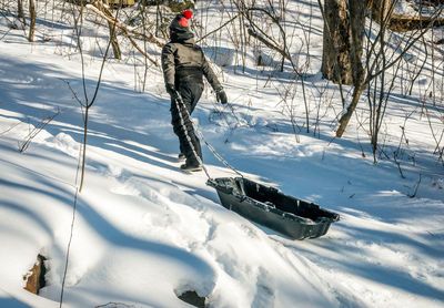 Man on snow covered field