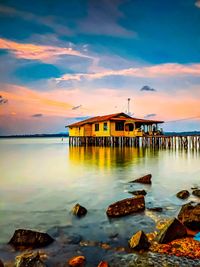 Scenic view of sea against sky during sunset