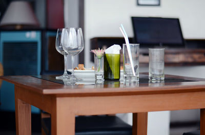 Wine glass on table at bar restaurant