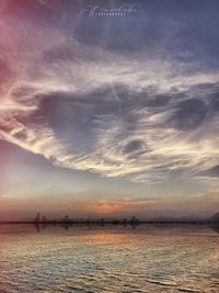 Scenic view of sea against sky at sunset