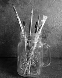 Close-up of glass jar on table