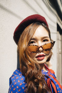 Portrait of woman standing outdoors