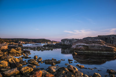 Scenic view of sea against sky during sunset