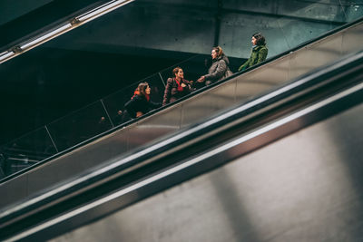 High angle view of people on escalator