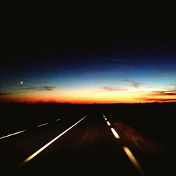 Empty road along landscape