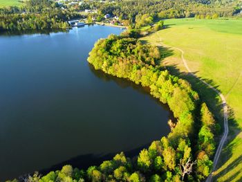 High angle view of road by lake