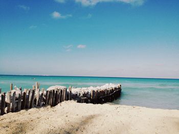 Scenic view of beach against sky