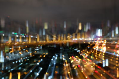 High angle view of illuminated cityscape at night