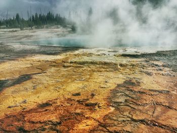 Smoke emitting from volcanic landscape