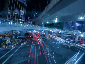 High angle view of light trails on road in city