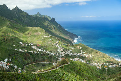 High angle view of sea shore against sky