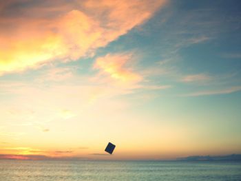 Scenic view of sea at sunset