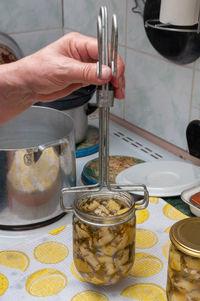 Midsection of person preparing food on table