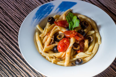 Close-up of pasta in plate on table