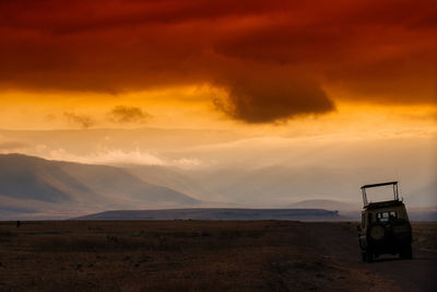 Scenic view of landscape against sky during sunset