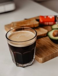 Close-up of coffee cup on table