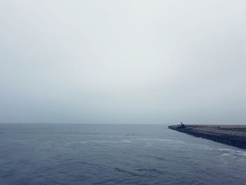 View of calm sea against clear sky