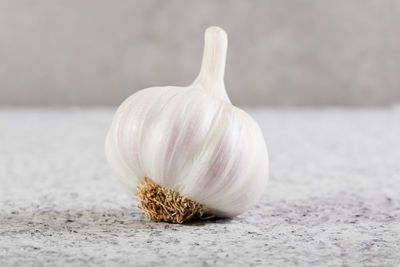 Close-up of garlic bulb on table