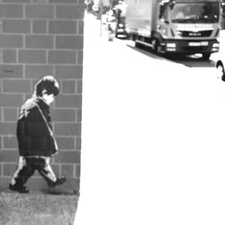 Woman standing on city street