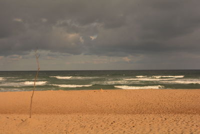 Scenic view of beach against sky