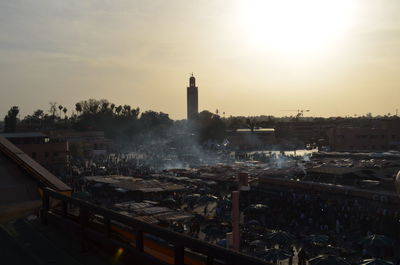 Cityscape against sky during sunset