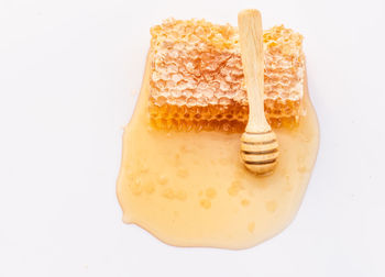 Close-up of cake against white background