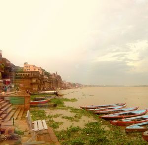 Panoramic view of sea and city against sky