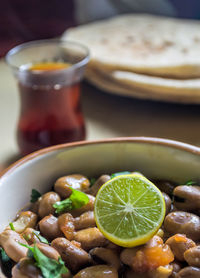 Close-up of fruits in plate on table