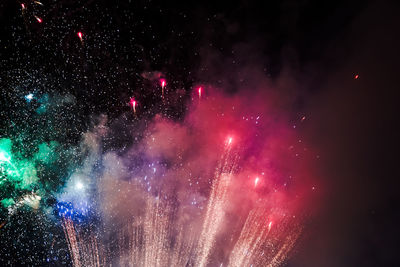 Firework display at night