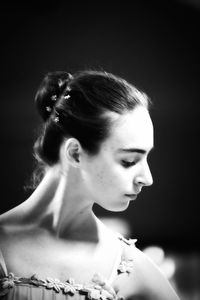 Portrait of young woman looking away