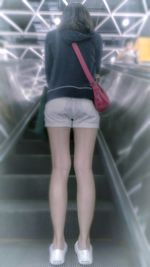 Close-up of woman standing in pond